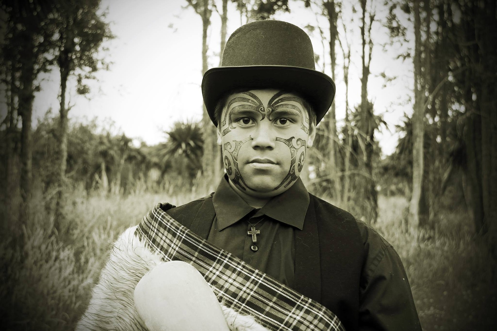 A tattooed male Maori face