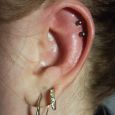 Double helix piercing with studs
