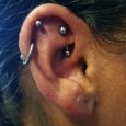 A rook and two helix piercings