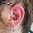 A rook and conch piercing