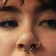 A septum piercing to match existing nose piercings