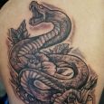 A snake on the thigh.