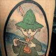 Snufkin from the Moomins in a frame