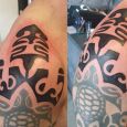 Påbyggnad av tribal med maori-tema