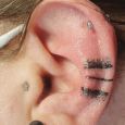 Black simple patterns on the ear