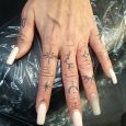 Small simple finger tattoos